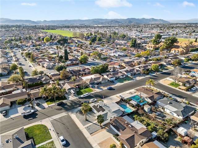 drone / aerial view with a residential view and a mountain view