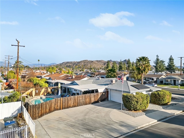 exterior space featuring a residential view and a mountain view