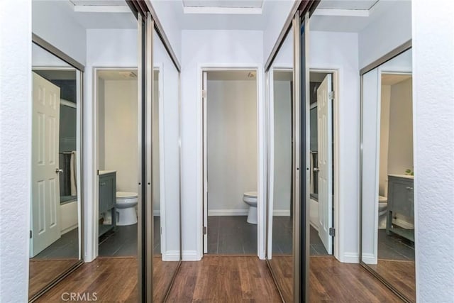 hall featuring wood finished floors