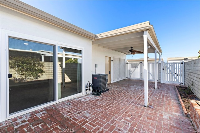 3902 Vista Campana N Unit 45, Oceanside, CA 92057 - view of patio / terrace featuring fence, a gate, central AC unit, and ceiling fan