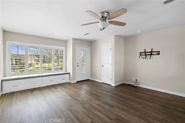 3902 Vista Campana N Unit 45, Oceanside, CA 92057 - empty room with visible vents, baseboards, dark wood-type flooring, and ceiling fan