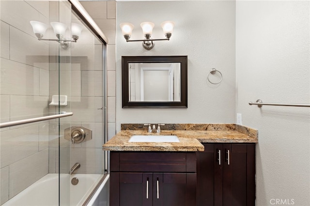 3902 Vista Campana N Unit 45, Oceanside, CA 92057 - bathroom with vanity and bath / shower combo with glass door