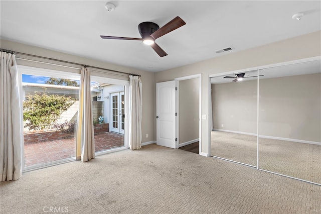 3902 Vista Campana N Unit 45, Oceanside, CA 92057 - unfurnished bedroom with visible vents, carpet floors, access to exterior, baseboards, and ceiling fan