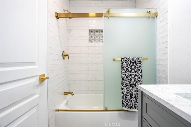 bathroom featuring shower / bathing tub combination and vanity