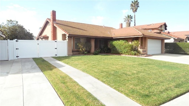 view of front of house with driveway, a tile roof, an attached garage, a gate, and a front lawn