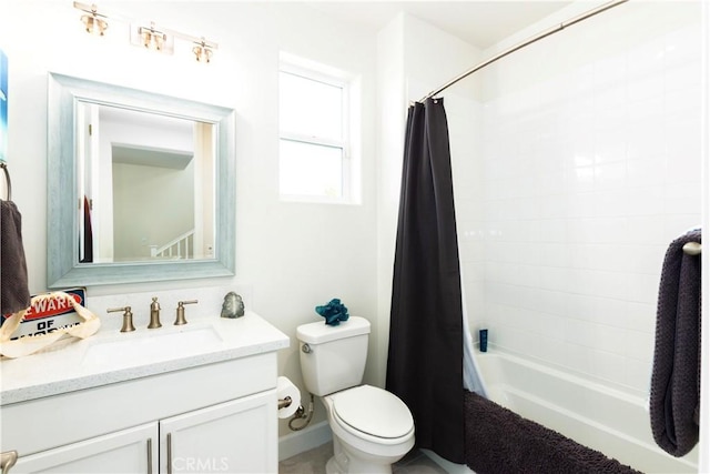 full bathroom featuring vanity, toilet, and shower / bathtub combination with curtain