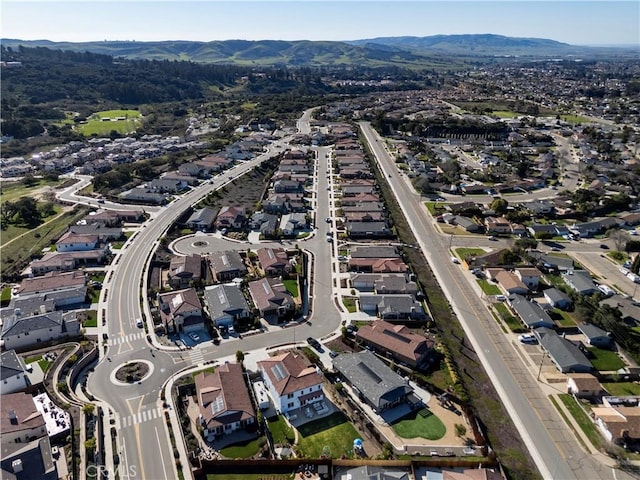 bird's eye view featuring a residential view and a mountain view