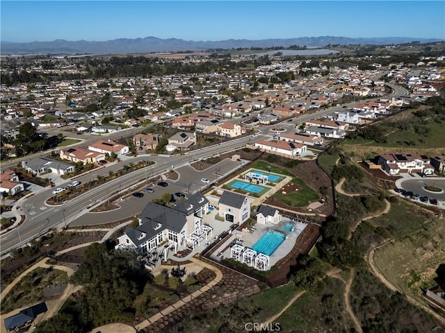 birds eye view of property featuring a residential view and a mountain view