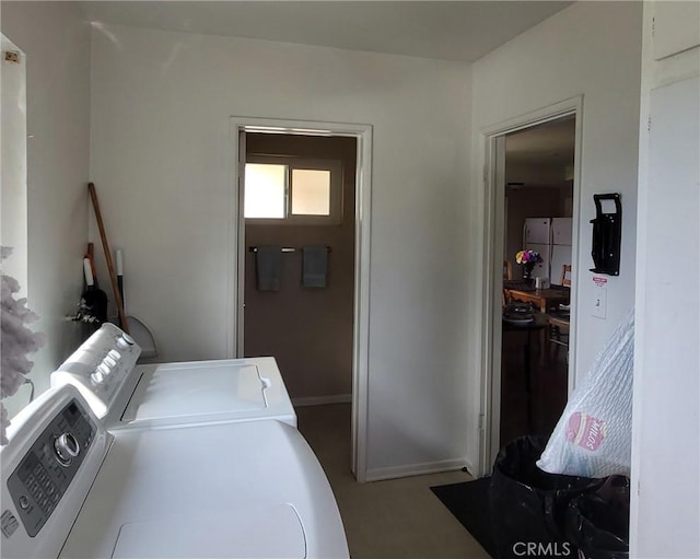 clothes washing area with laundry area and independent washer and dryer