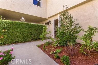 exterior space featuring stucco siding