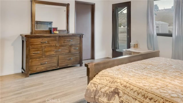 bedroom with light wood-style flooring