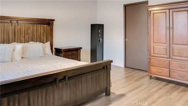 bedroom featuring light wood-type flooring