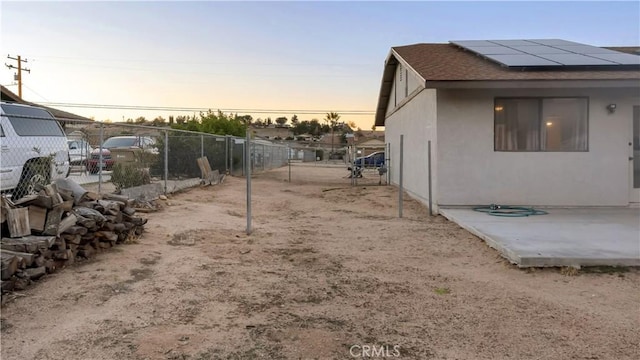 view of yard featuring a patio area and fence