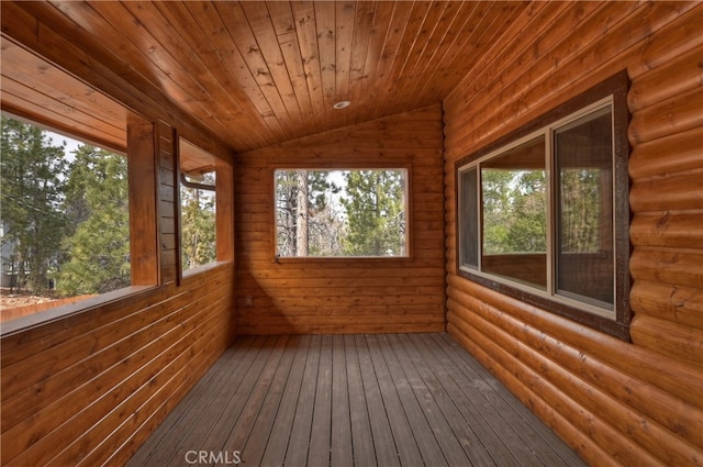 unfurnished sunroom with wooden ceiling, vaulted ceiling, and a sauna