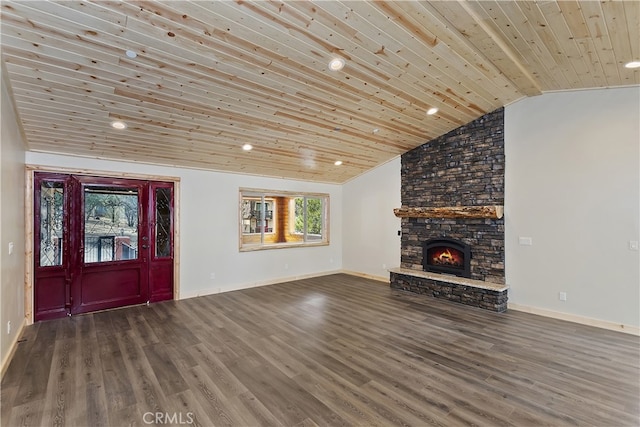 unfurnished living room featuring wooden ceiling, a fireplace, wood finished floors, baseboards, and vaulted ceiling