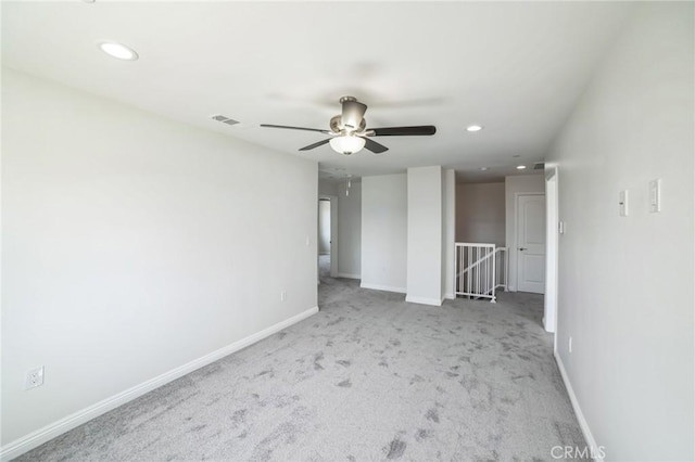 unfurnished bedroom with carpet floors, recessed lighting, visible vents, and baseboards