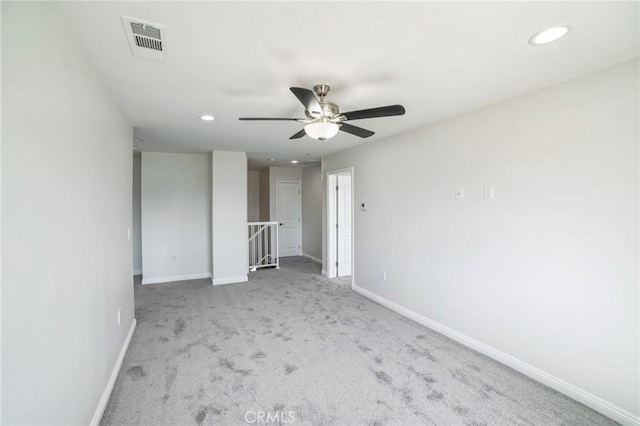 unfurnished bedroom featuring recessed lighting, visible vents, a ceiling fan, carpet flooring, and baseboards