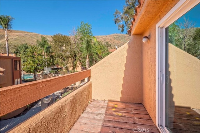 balcony featuring a mountain view