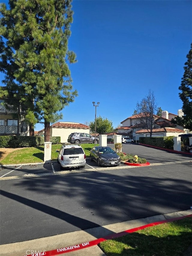 view of front of home featuring uncovered parking