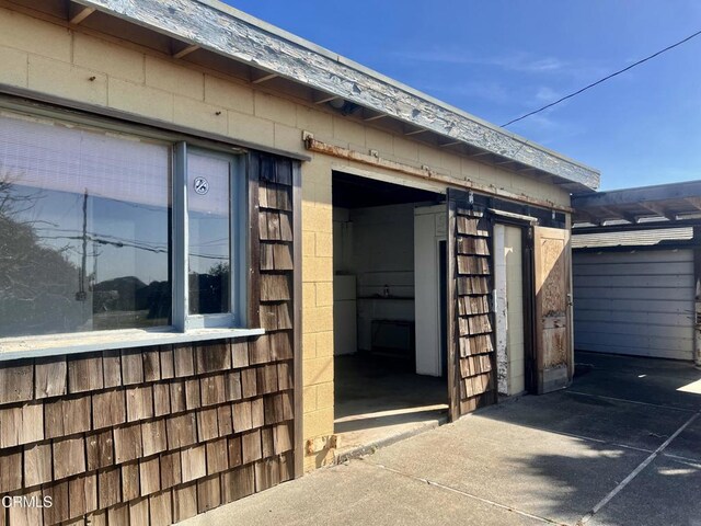 exterior space featuring washer / clothes dryer