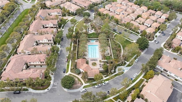 birds eye view of property with a residential view