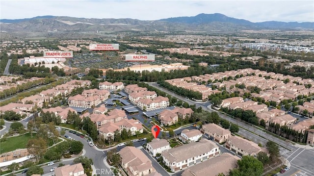 birds eye view of property featuring a residential view and a mountain view