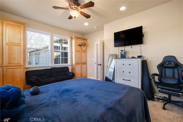 bedroom with ceiling fan, recessed lighting, and light colored carpet