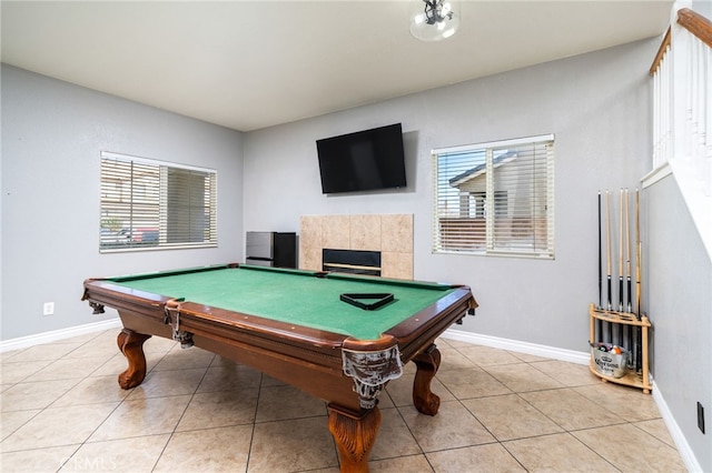 playroom featuring light tile patterned floors, pool table, and a wealth of natural light