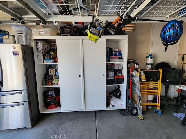 garage with freestanding refrigerator