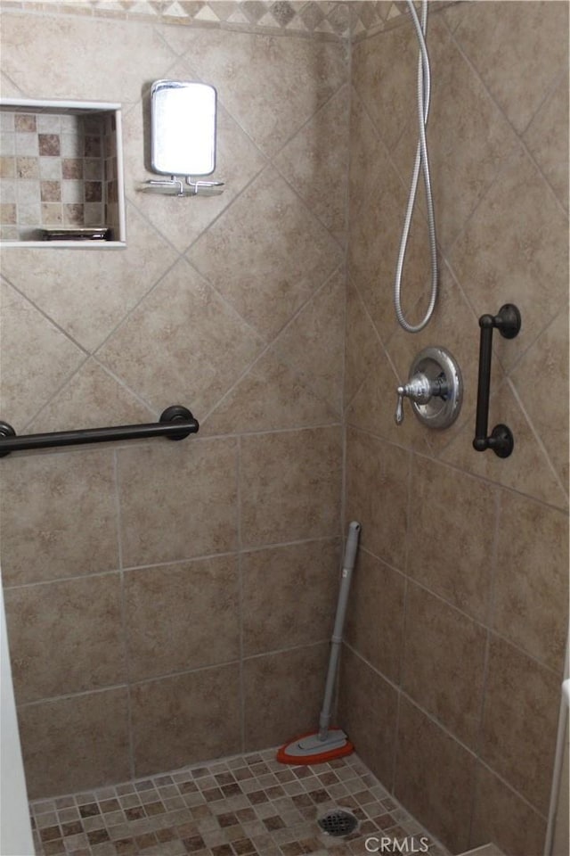 full bath featuring a stall shower