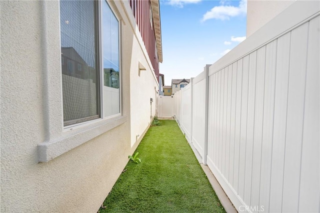 view of yard with a fenced backyard