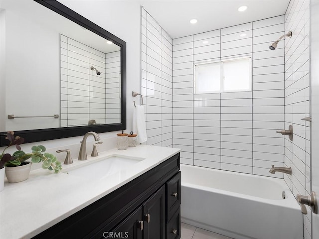 bathroom with  shower combination, recessed lighting, vanity, and tile patterned floors