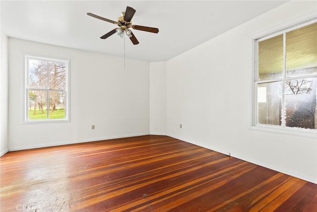 unfurnished room featuring a ceiling fan and hardwood / wood-style floors