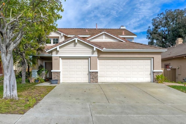 craftsman-style home with stone siding, an attached garage, concrete driveway, and stucco siding