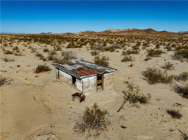 mountain view featuring view of desert