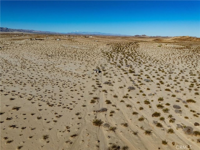 view of landscape featuring view of desert and a mountain view