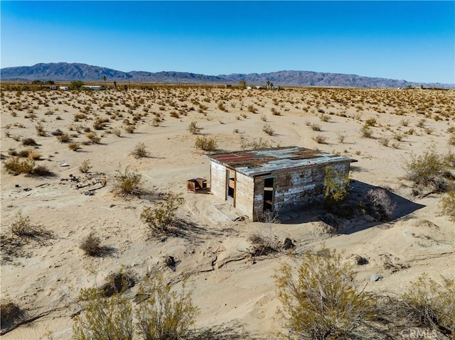 mountain view featuring view of desert