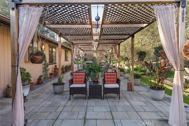 view of patio / terrace featuring outdoor dining area and a pergola