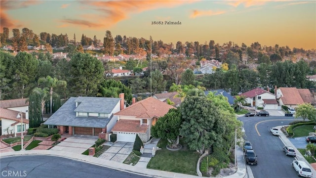 birds eye view of property with a residential view