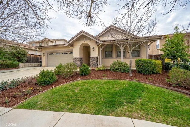 view of front facade featuring stucco siding, concrete driveway, an attached garage, a front yard, and stone siding