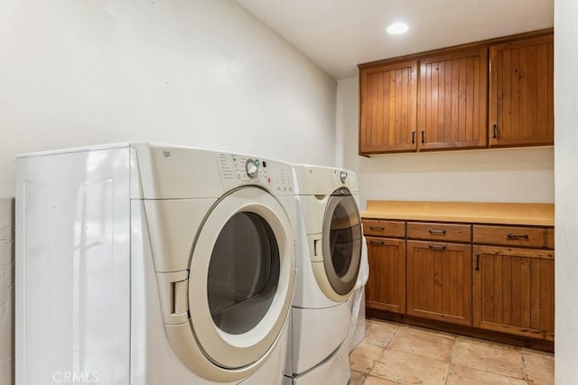 washroom with cabinet space, recessed lighting, and independent washer and dryer