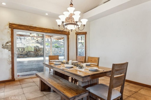 dining room with light tile patterned floors, baseboards, a notable chandelier, and recessed lighting