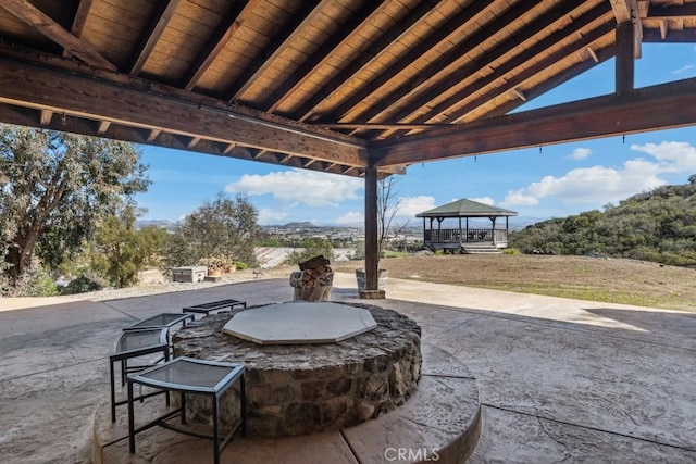 view of patio / terrace featuring area for grilling and a gazebo