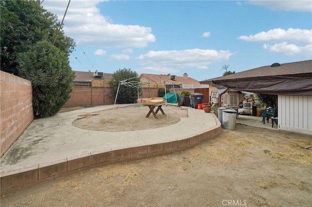 view of yard featuring a fenced backyard and a patio