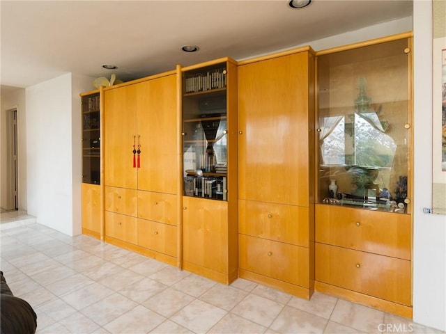 kitchen with light tile patterned flooring and recessed lighting