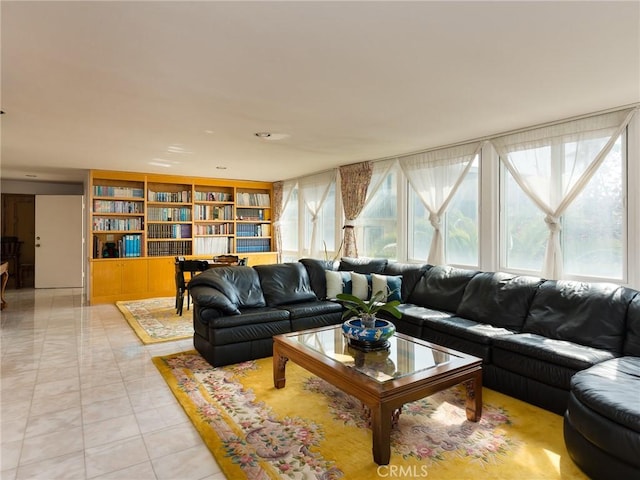 living area with light tile patterned flooring