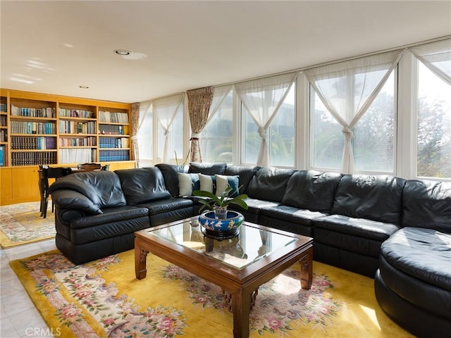 living area featuring tile patterned floors