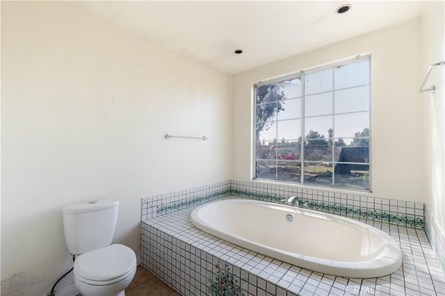 6125 Ridgeview Ave, Jurupa Valley, CA 91752 - bathroom featuring a garden tub and tile patterned flooring
