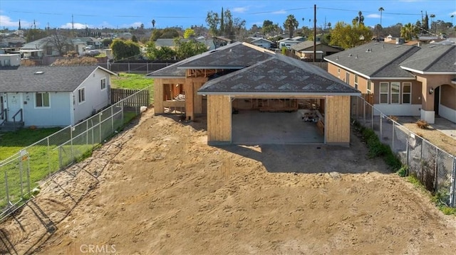 view of horse barn with a residential view