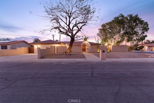 3190 E Vincentia Rd, Palm Springs, CA 92262 - single story home featuring a fenced front yard and a gate